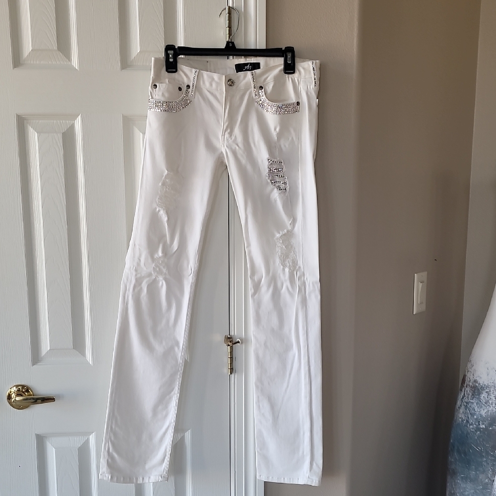 White Distressed Jeans with Embellished Pockets. Swarovski Crystals